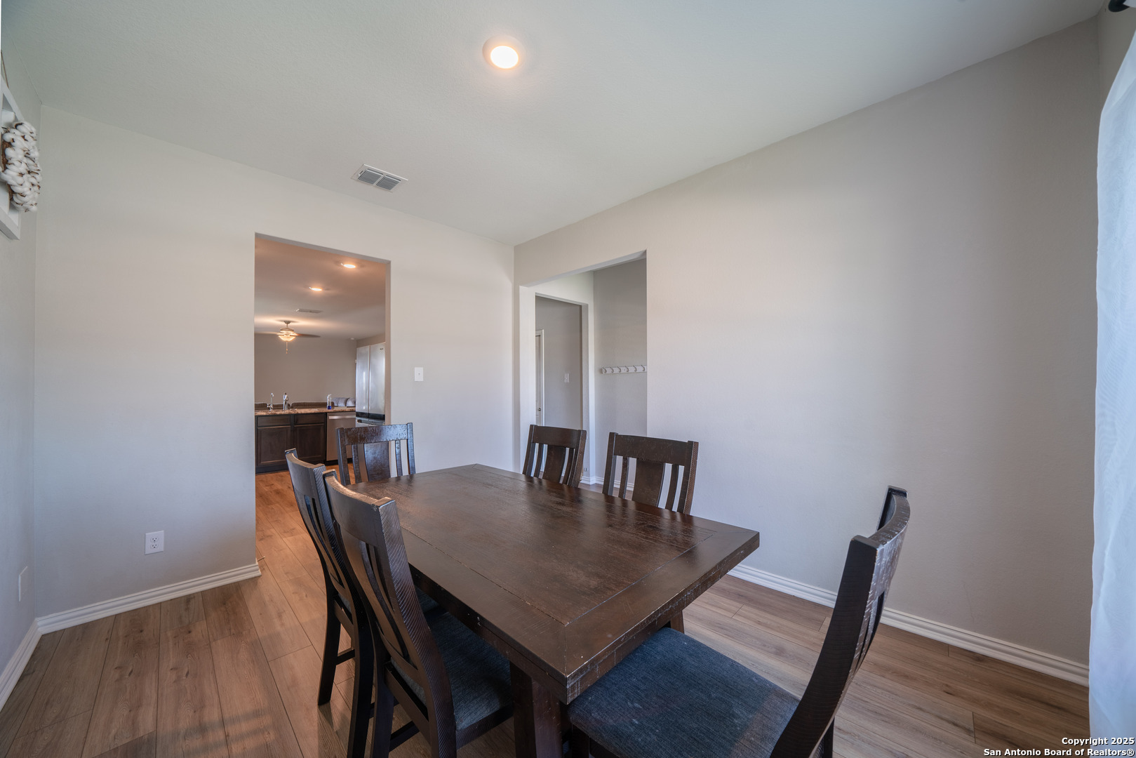 6430 Thorpe Converse, TX 78109 - Photo 5 of 25 a view of a dining room with furniture and wooden floor