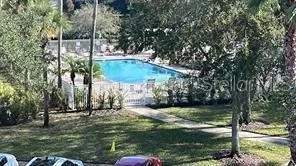 a garden view with a fountain
