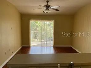 a kitchen with stainless steel appliances granite countertop a sink and a refrigerator