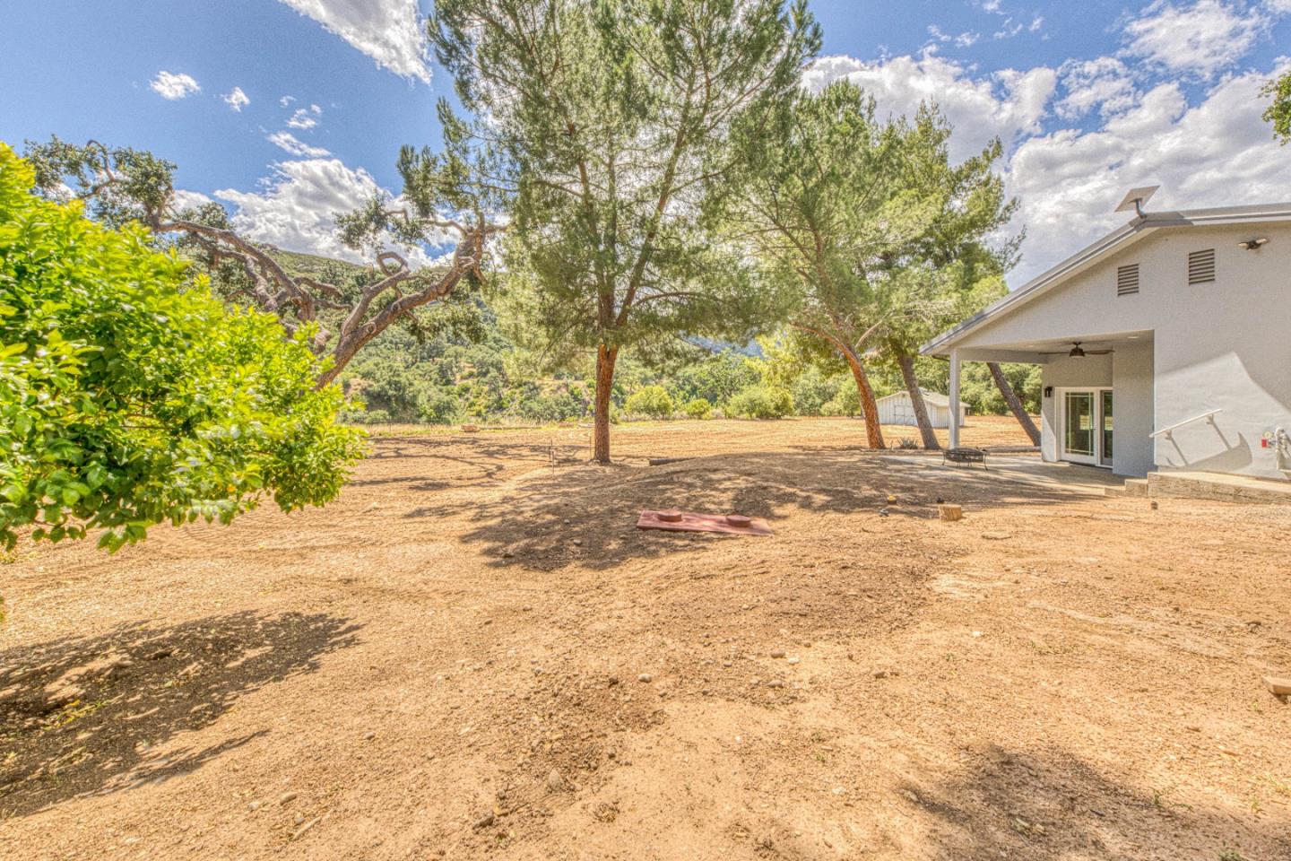 47317 Arroyo Seco Road Greenfield, CA 93927 - Photo 33 of 47 a view of a yard with a tree