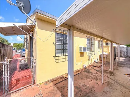 a view of a porch with furniture