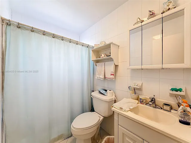 a view of house with outdoor space patio and swimming pool