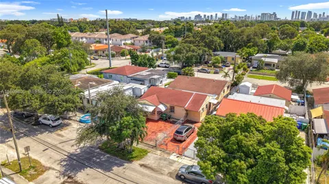 an aerial view of a swimming pool and mountain view