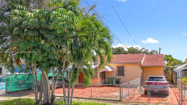 a aerial view of a house with street view