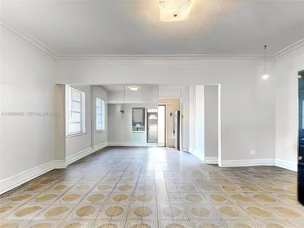 a view of a big room with a window