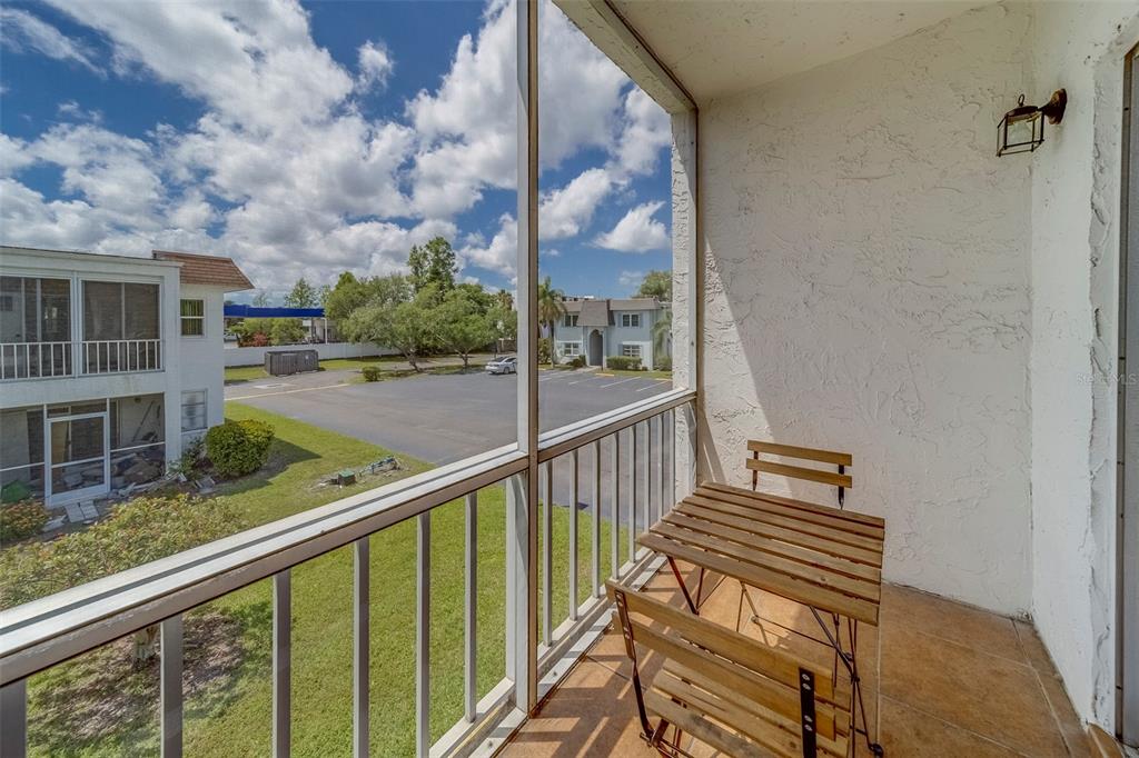 361 South McMullen Booth Road, Unit 112 Clearwater, FL 33759 - Photo 25 of 36 a view of city from a balcony
