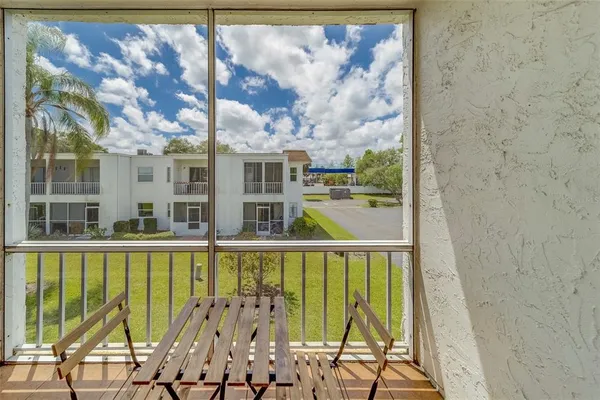 a view of a large window with an outdoor space