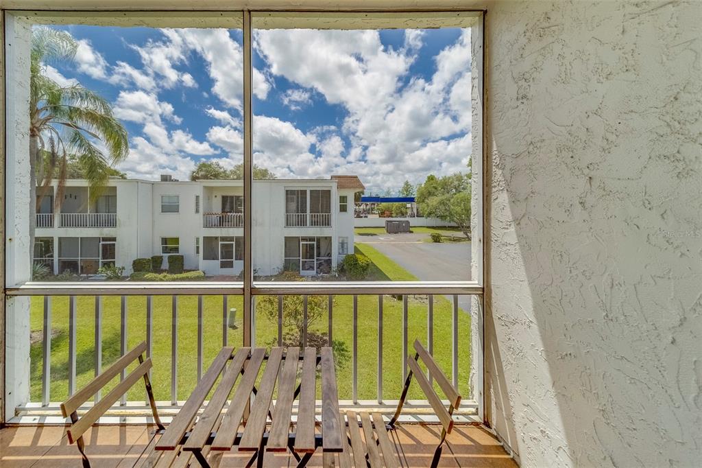 361 South McMullen Booth Road, Unit 112 Clearwater, FL 33759 - Photo 26 of 36 a view of a large window with an outdoor space