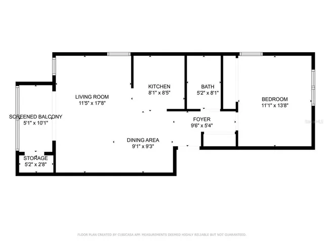 a picture of a building with a white fence