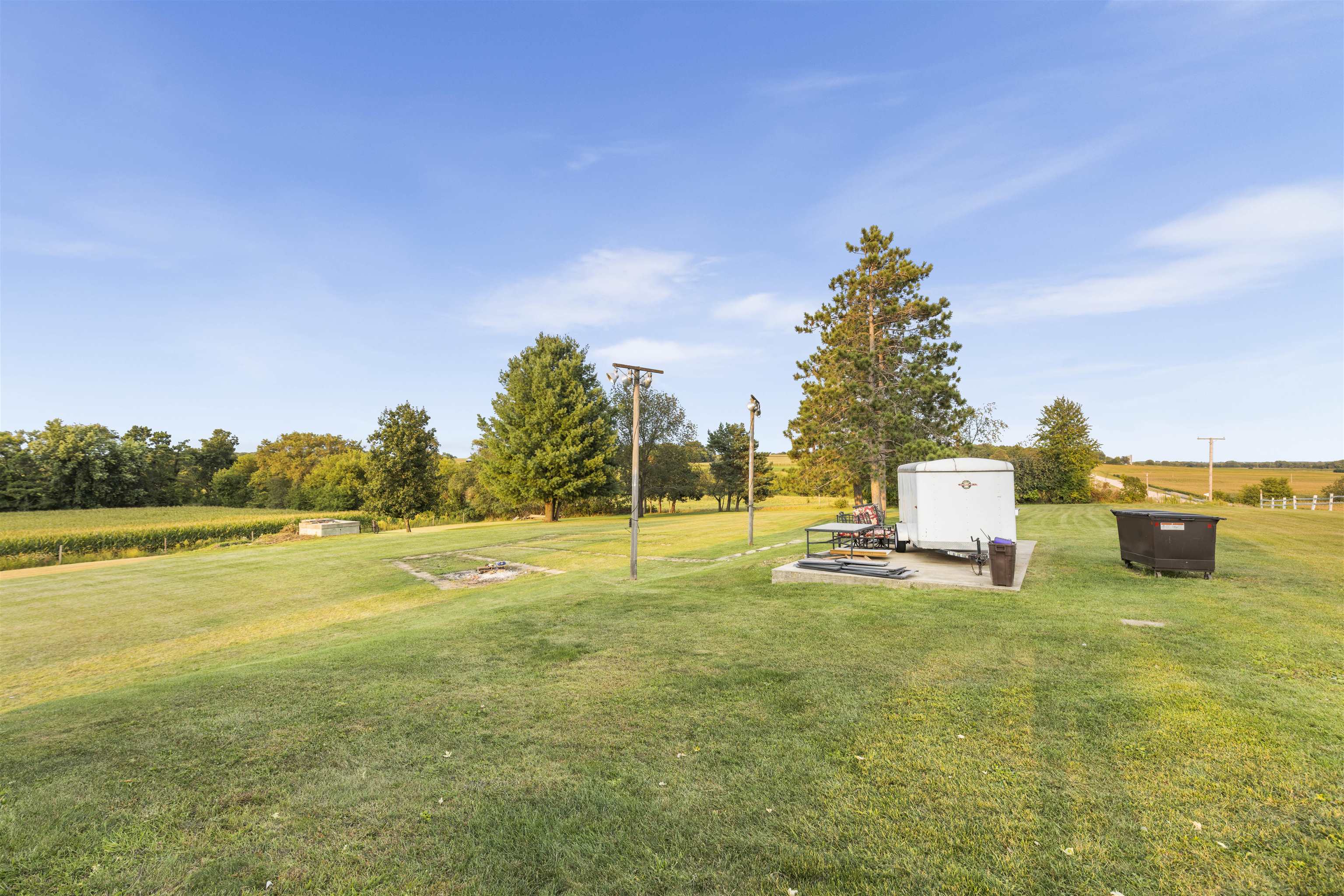 4524 East River Road Ridott, IL 61067 - Photo 27 of 28 a view of a lake with couches and city view