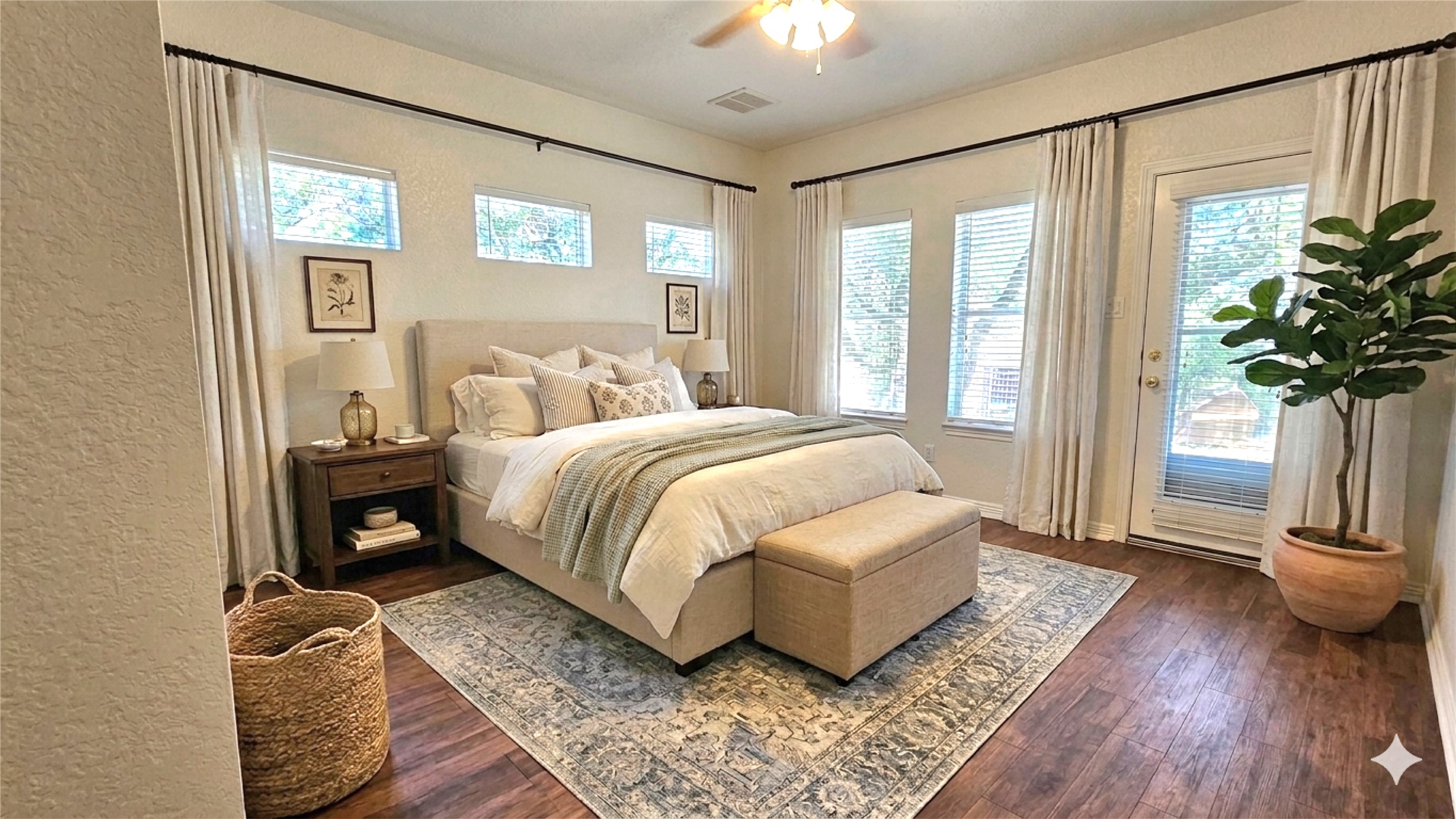 1301 County Road 262 Georgetown, TX 78633 - Photo 17 of 39 Bedroom featuring dark wood-finish flooring, multiple windows providing natural light, a ceiling fan with light fixture, and a glass-paneled door