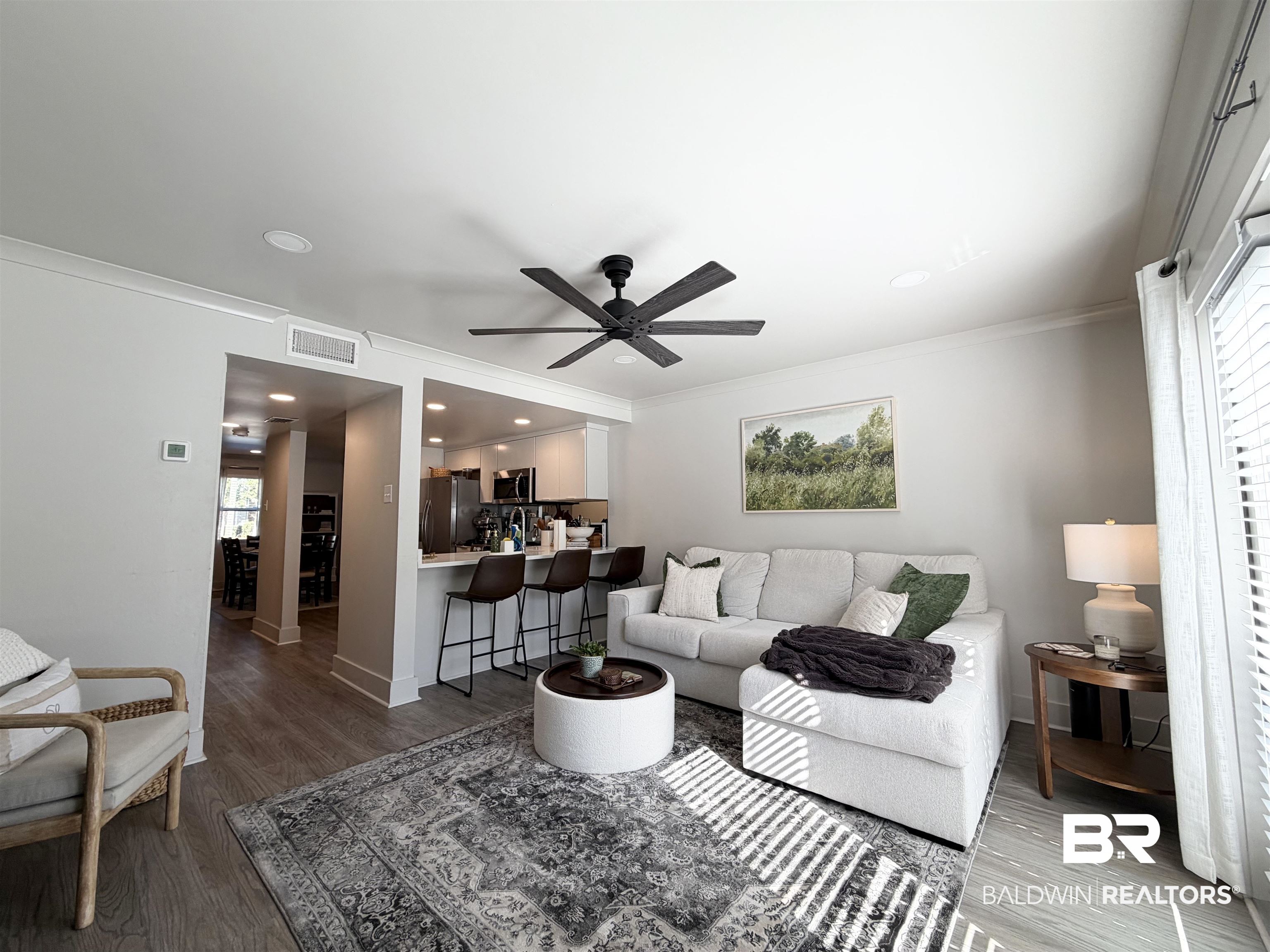 3655 Old Shell Road, Unit 211 Mobile, AL 36608 - Photo 6 of 17 Living room with dark wood-style flooring, ceiling fan, crown molding, and recessed lighting
