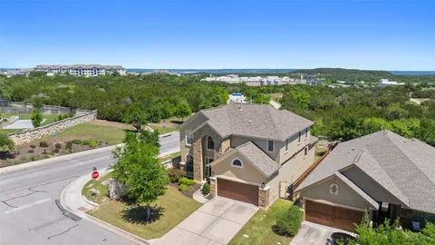 an aerial view of a house with a garden
