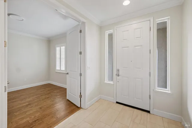 a bathroom with a double vanity sink a mirror and a shower