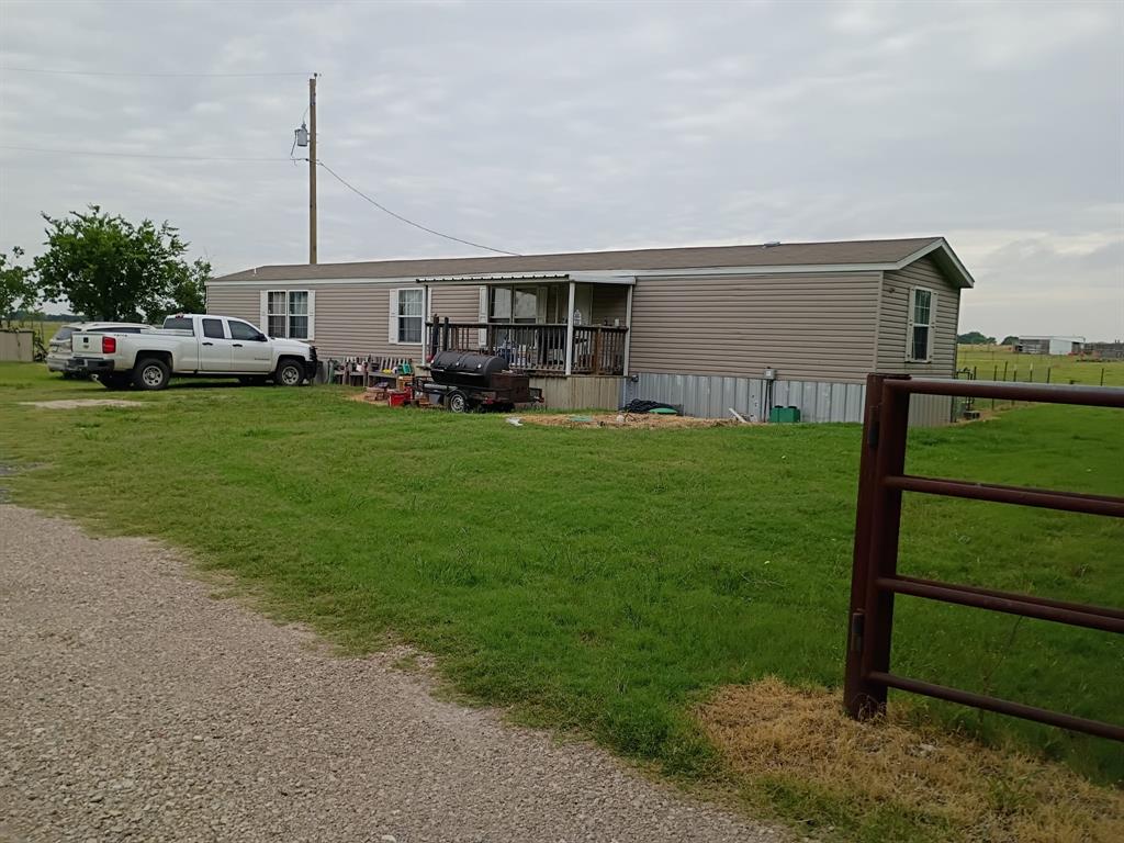 620 Blair Road Waxahachie, TX 75165 - Photo 1 of 2 a view of a house with backyard