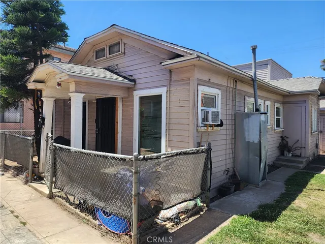 a front view of a house with balcony