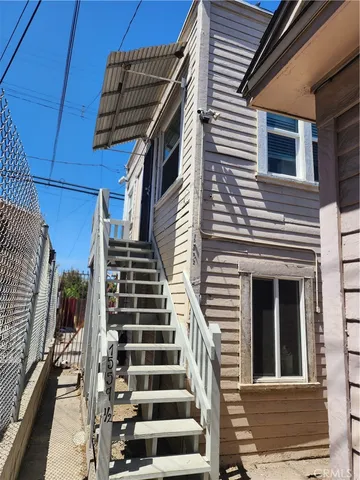 a view of a house with a patio