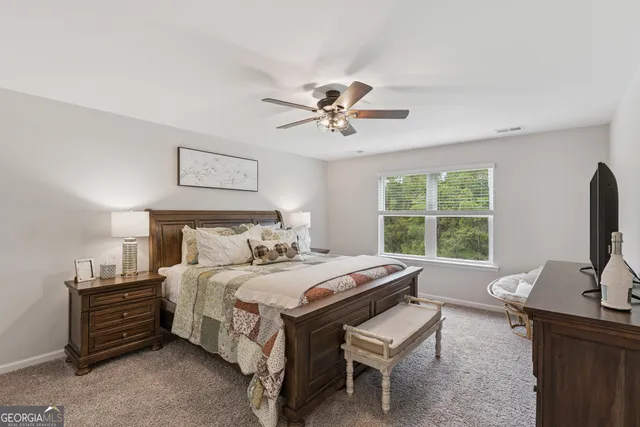 a bathroom with a sink double vanity and a mirror