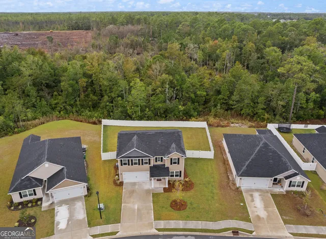 an aerial view of residential building with parking space