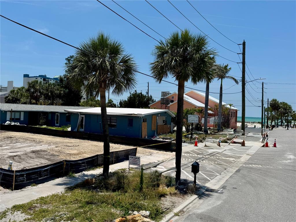 630 Corey Avenue St. Pete Beach, FL 33706 - Photo 4 of 9 a view of a backyard patio and palm tree