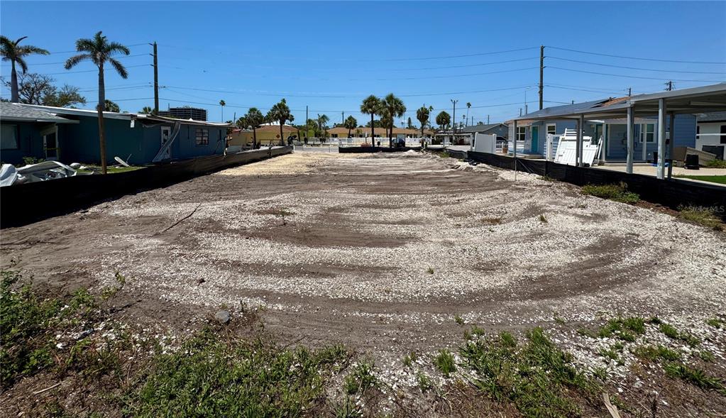 630 Corey Avenue St. Pete Beach, FL 33706 - Photo 8 of 9 a view of a house with a yard
