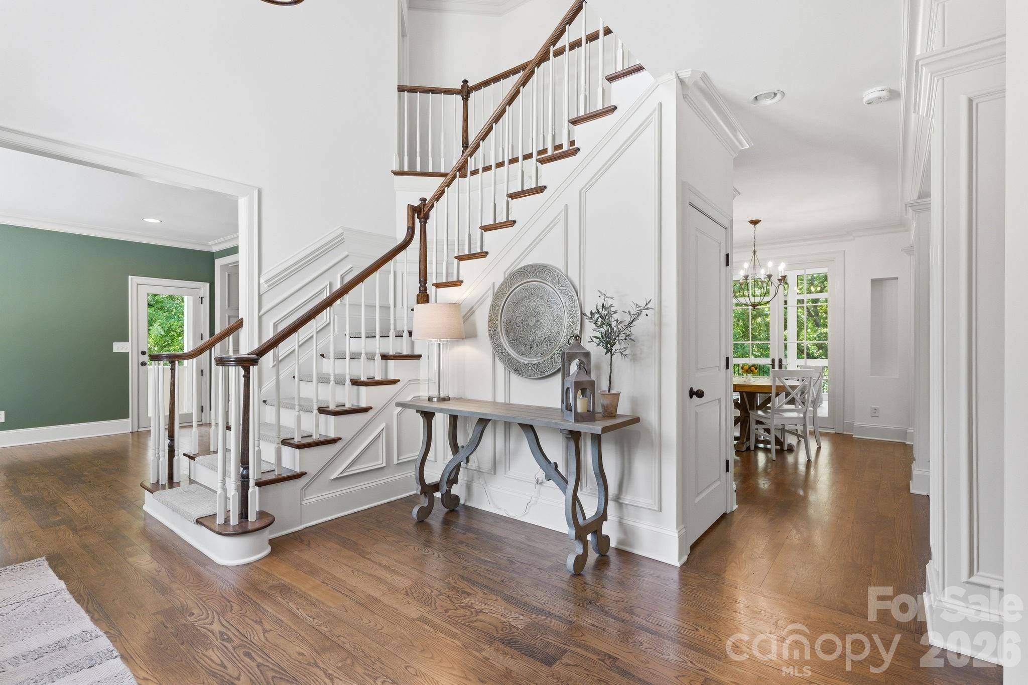 235 Grey Road Davidson, NC 28036 - Photo 2 of 42 a view of entryway and hall with wooden floor