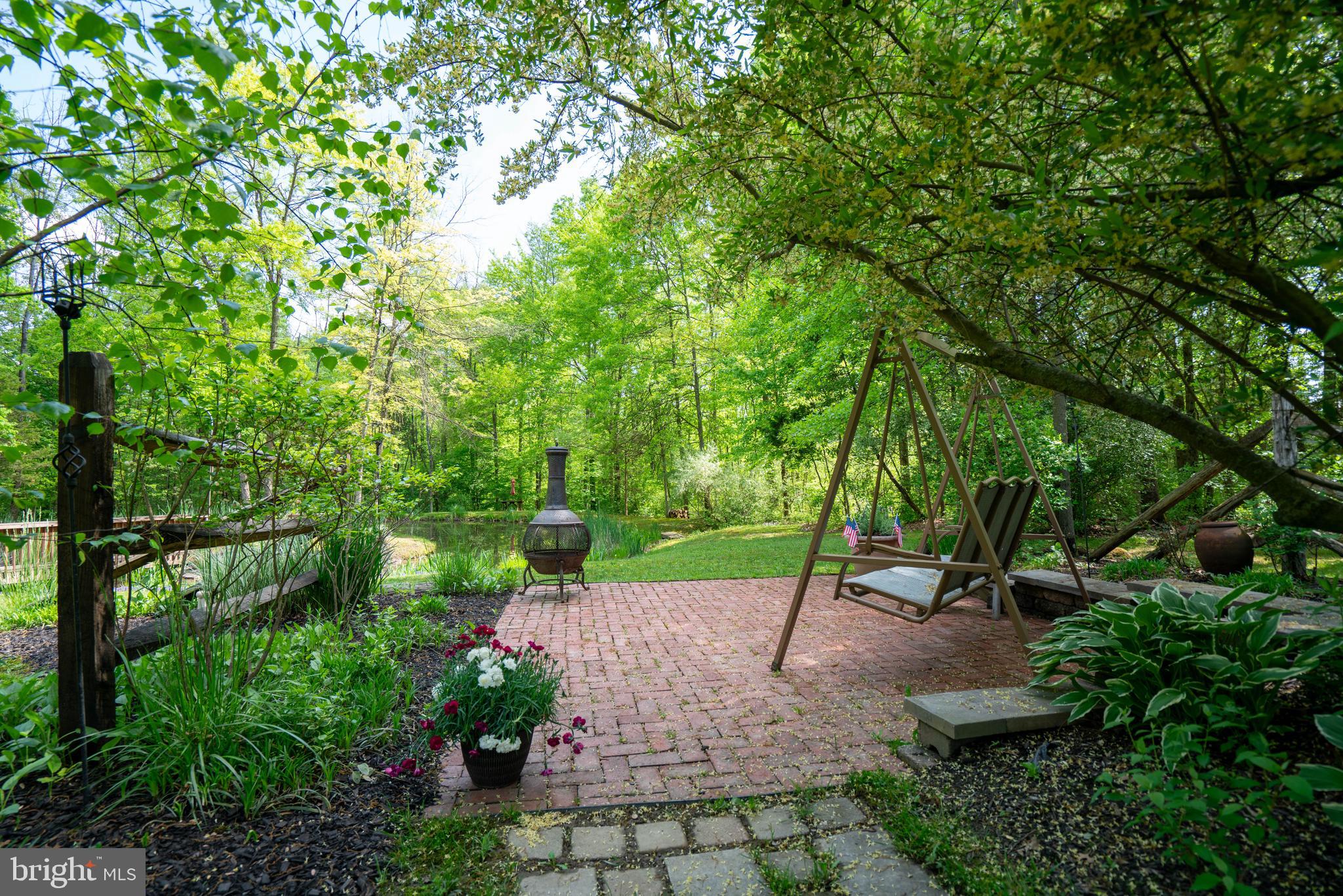 1707 West Rock Road Perkasie, PA 18944 - Photo 62 of 71 Brick Patio amidst Landscaping