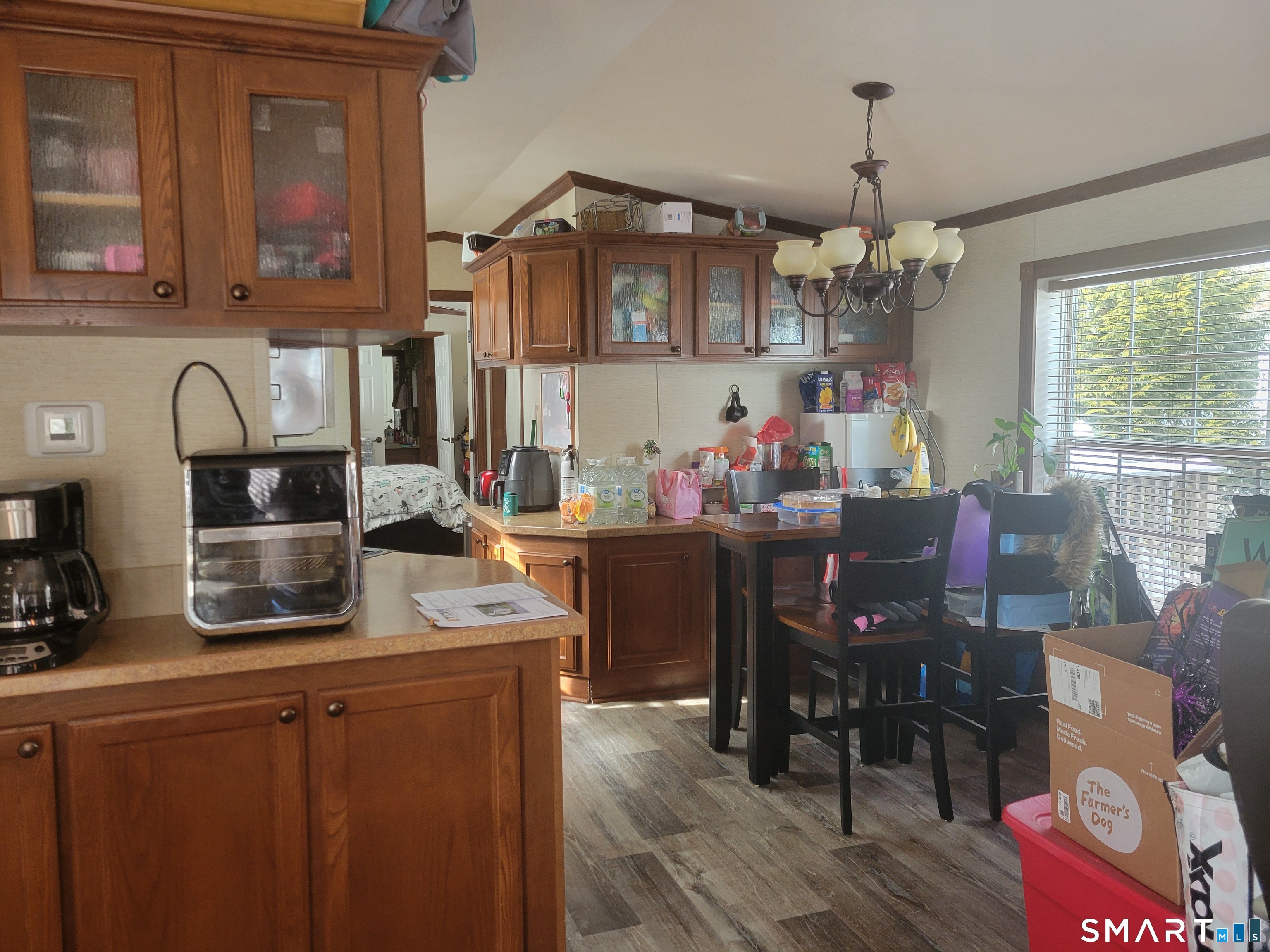 944 Long Cove Road Ledyard, CT 06335 - Photo 2 of 12 a kitchen with a sink cabinets and window