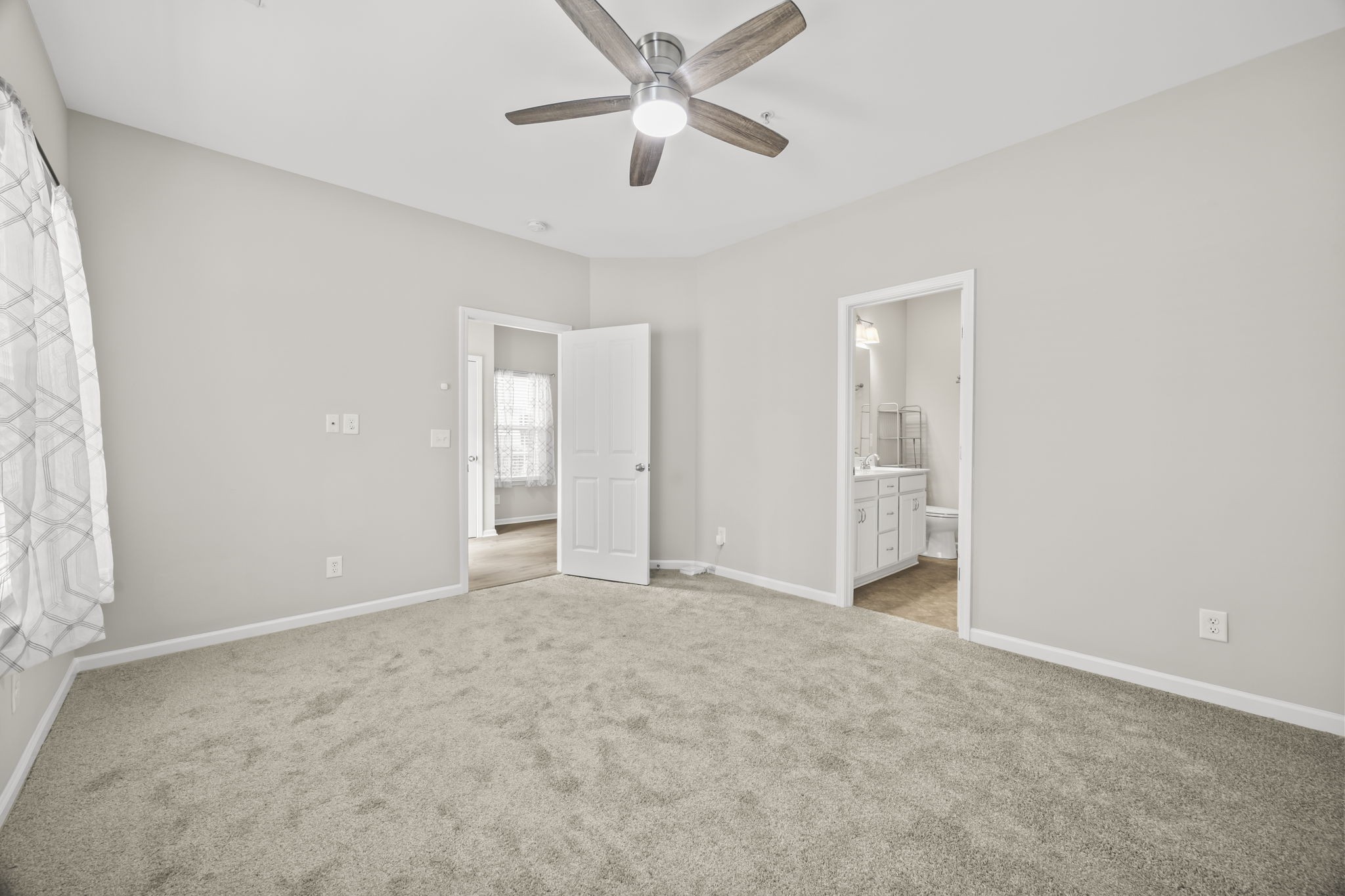 501 Shirebrook Circle Spring Hill, TN 37174 - Photo 11 of 26 an empty room with closet and a ceiling fan