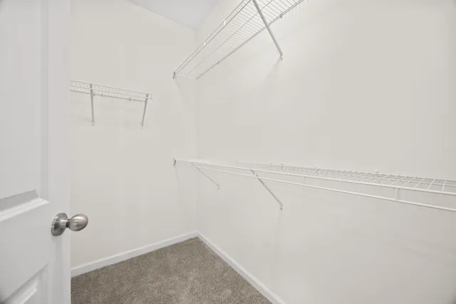 a view of small space with racks on the wall