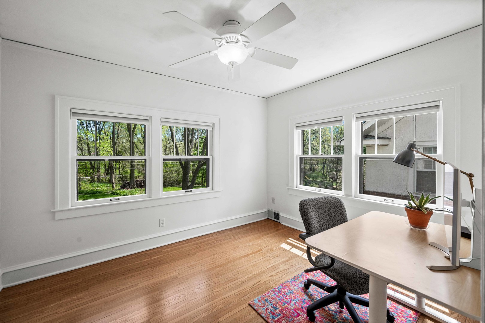 1302 Hillcrest Street Normal, IL 61761 - Photo 17 of 48 a workspace with furniture a chandelier and wooden floor