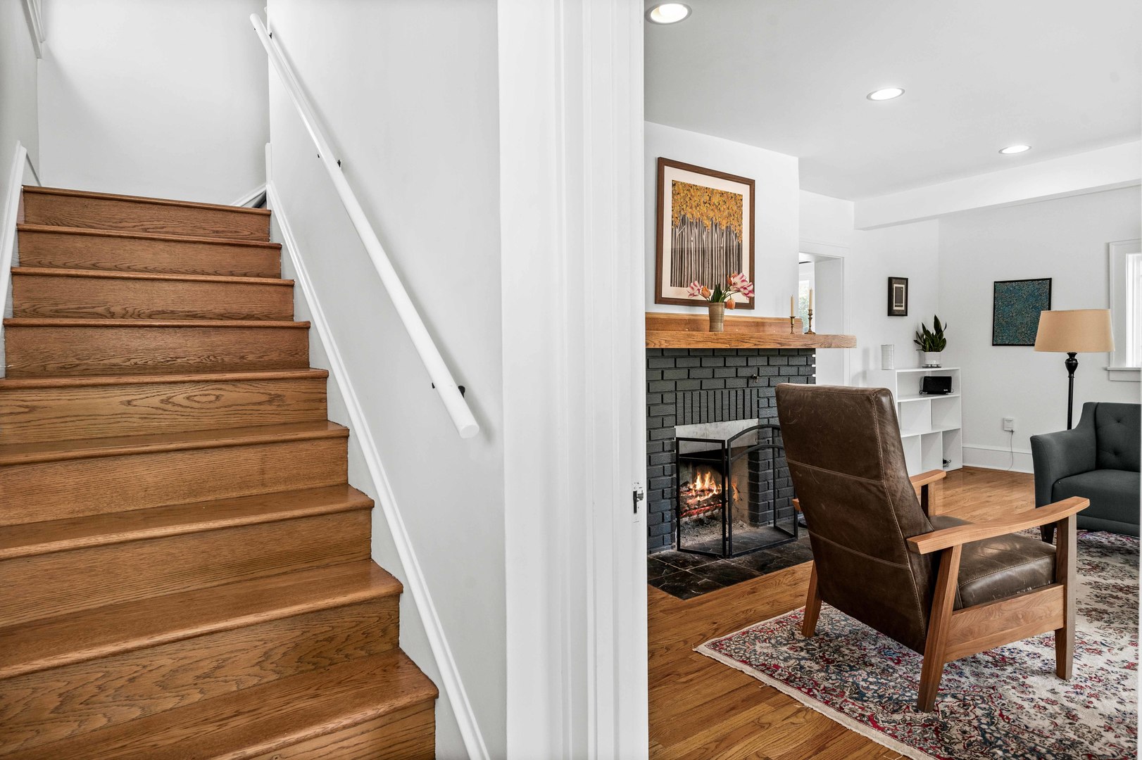 1302 Hillcrest Street Normal, IL 61761 - Photo 19 of 48 a living room with furniture and a fireplace