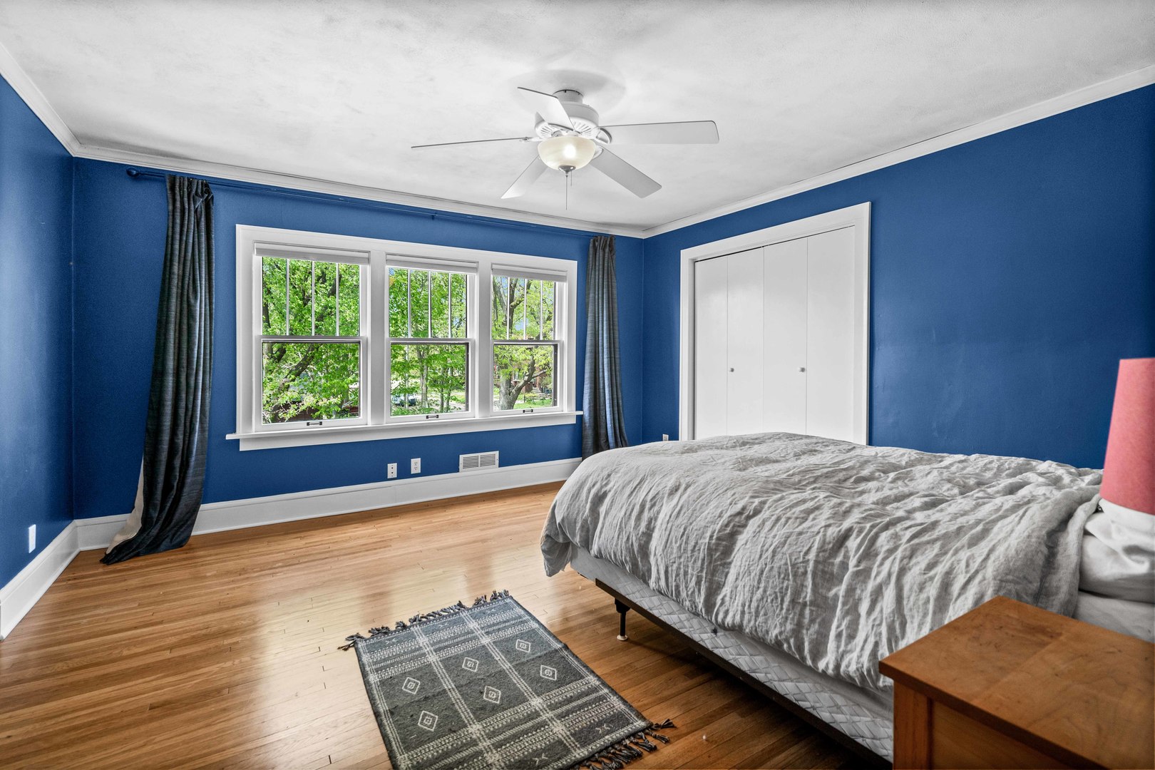 1302 Hillcrest Street Normal, IL 61761 - Photo 22 of 48 a bed sitting in a bedroom next to a window