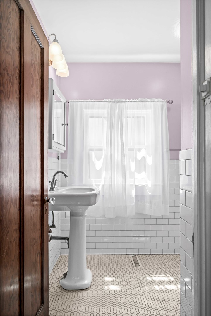 1302 Hillcrest Street Normal, IL 61761 - Photo 23 of 48 a bathroom with a shower