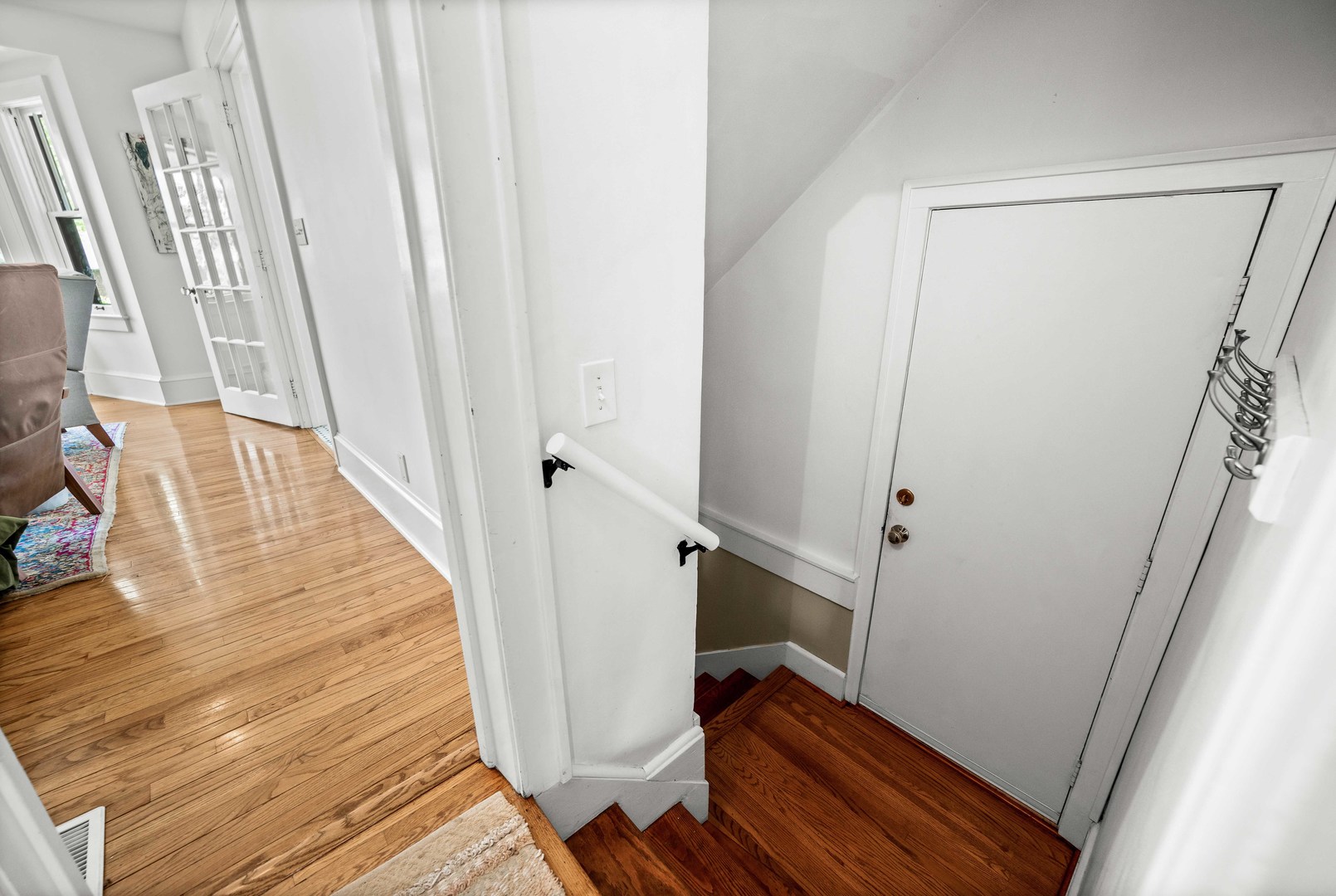 1302 Hillcrest Street Normal, IL 61761 - Photo 25 of 48 a view of a room with staircase and wooden floor