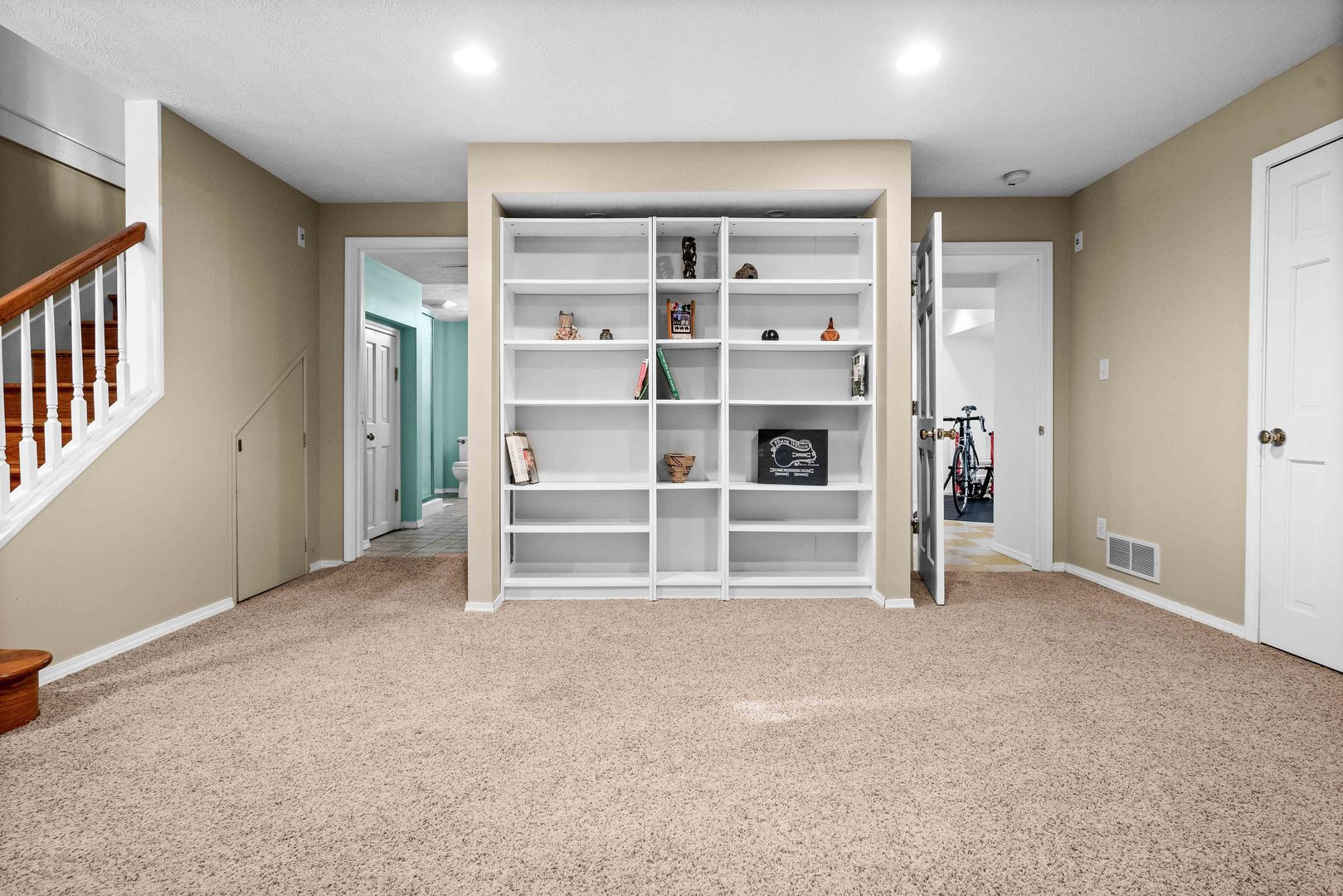1302 Hillcrest Street Normal, IL 61761 - Photo 28 of 48 a view of an empty room with a cabinet and a window