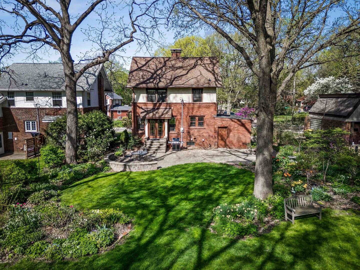 1302 Hillcrest Street Normal, IL 61761 - Photo 39 of 48 a view of a backyard with plants and a patio