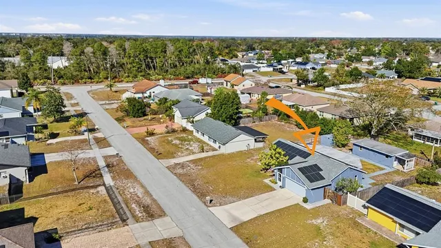 front view of a house with a fountain