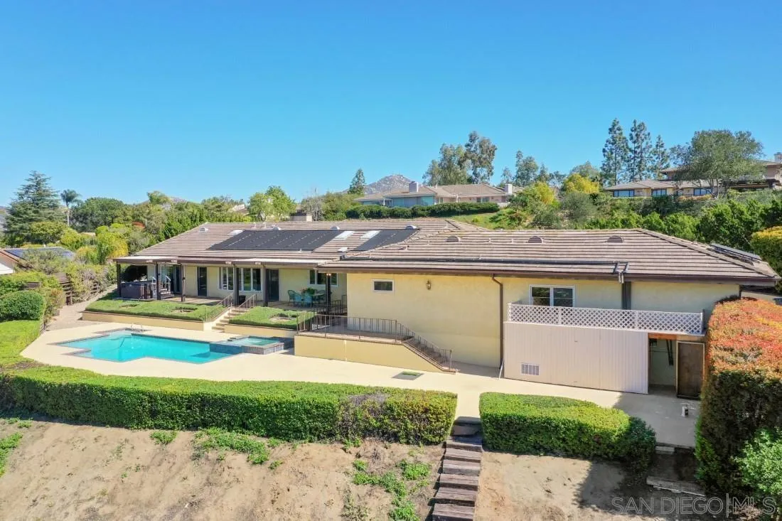 15938 Overview Road Poway, CA 92064 - Photo 14 of 72 a front view of a house with garden