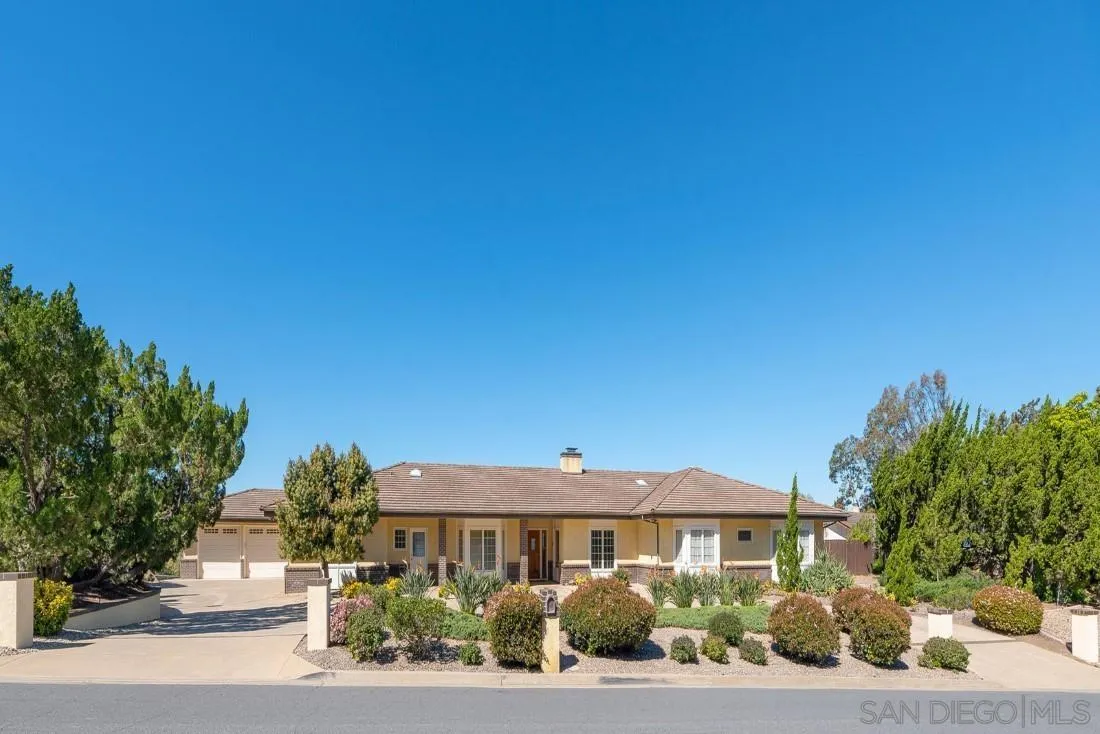 15938 Overview Road Poway, CA 92064 - Photo 15 of 72 a front view of a house with a yard