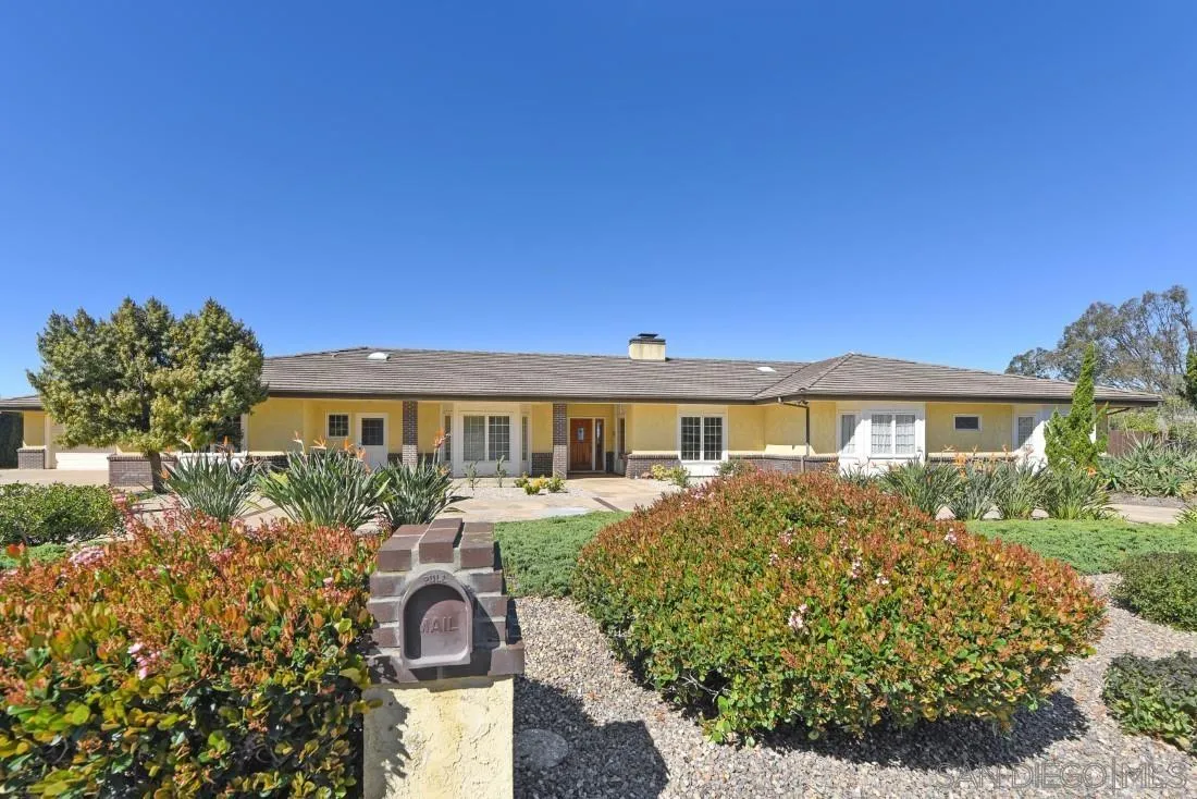 15938 Overview Road Poway, CA 92064 - Photo 17 of 72 a front view of a house with a yard