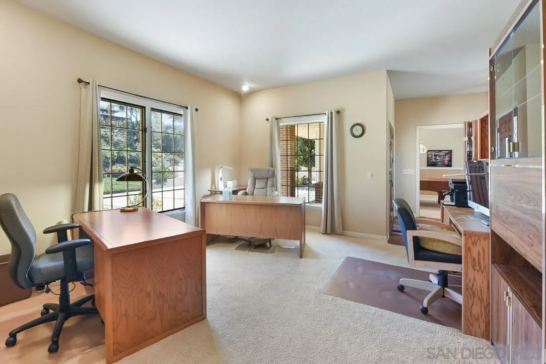 15938 Overview Road Poway, CA 92064 - Photo 40 of 72 a view of a workspace with furniture and a window