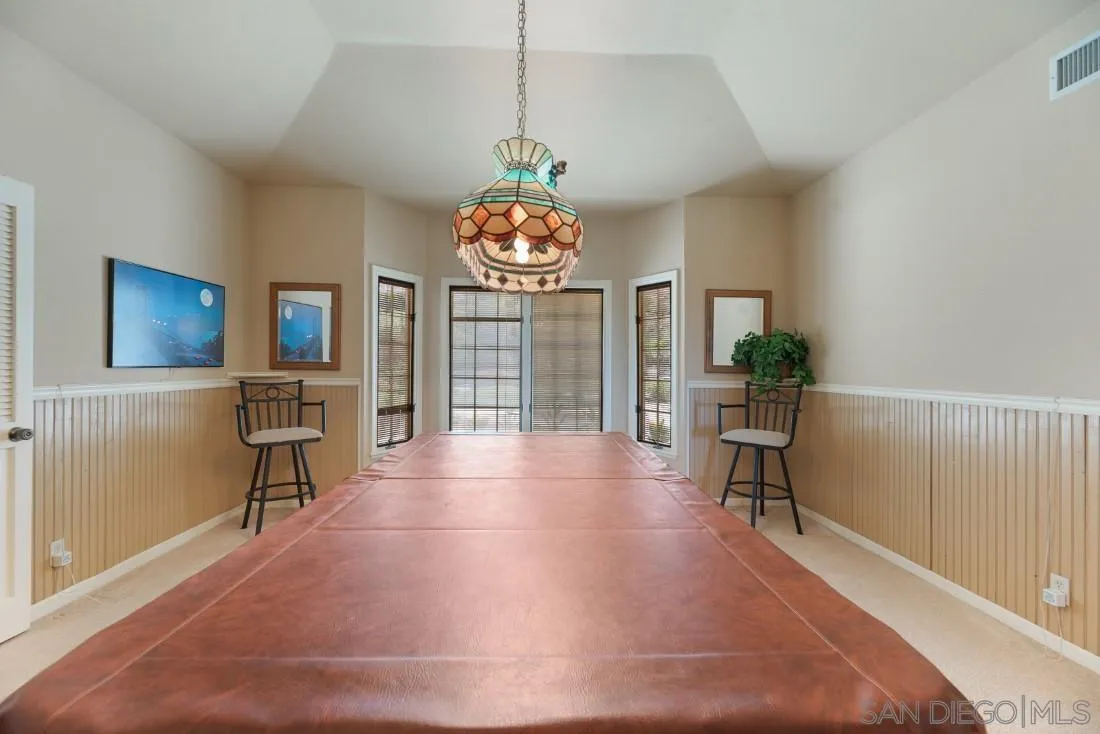 15938 Overview Road Poway, CA 92064 - Photo 43 of 72 a view of a livingroom with furniture a dinning room and stairs