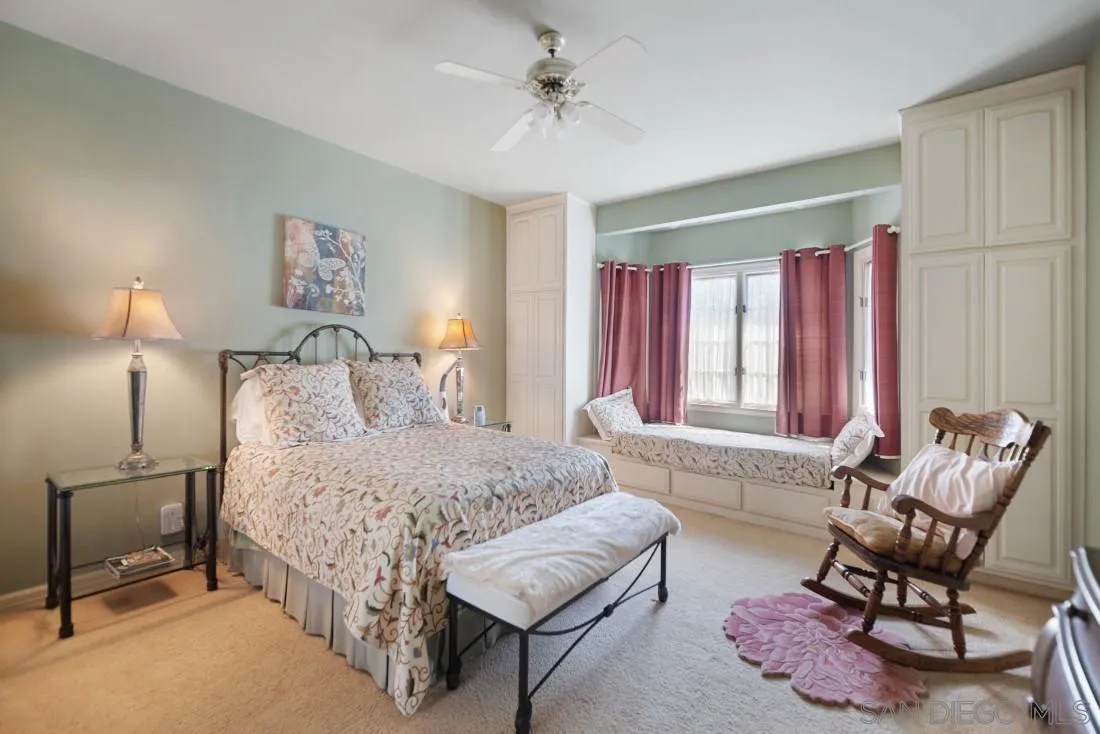 15938 Overview Road Poway, CA 92064 - Photo 45 of 72 a bedroom with a bed and a couch