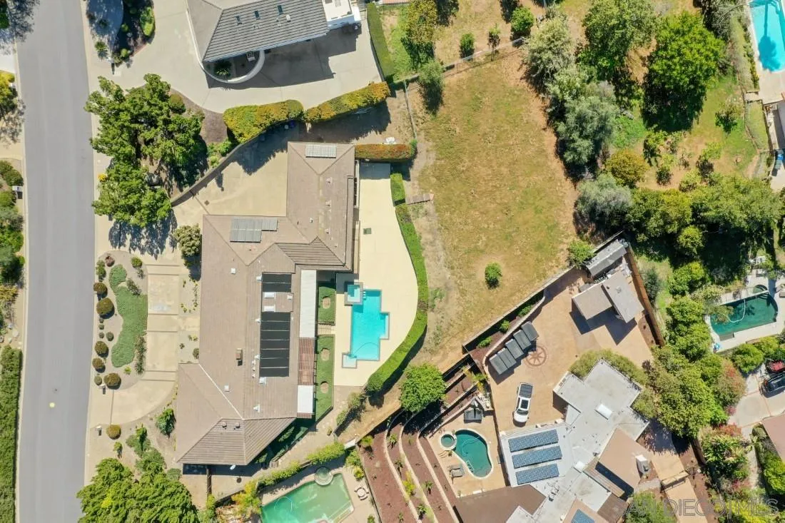15938 Overview Road Poway, CA 92064 - Photo 5 of 72 an aerial view of a house with a yard and balcony