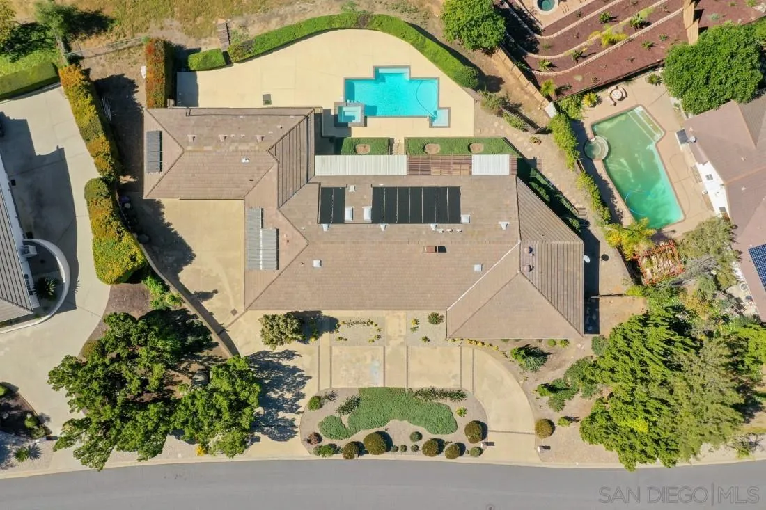 15938 Overview Road Poway, CA 92064 - Photo 6 of 72 an aerial view of a house with a yard and wooden fence