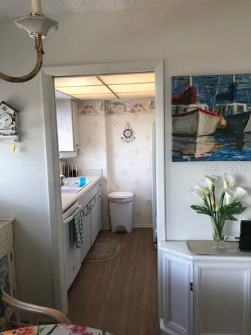 a bathroom with a sink a mirror and a shower