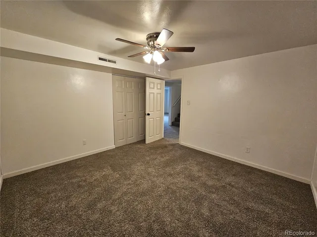 a view of a ceiling fan in a room