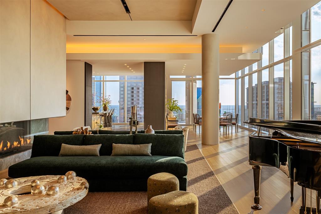 1747 Leonard Street, Unit 2601 Dallas, TX 75201 - Photo 14 of 33 a living room with furniture and a large window
