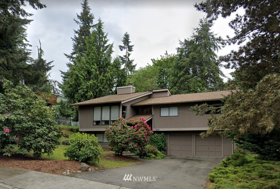 22100 1st Place West Bothell, WA 98021 - Photo 1 of 1 a front view of a house with a garden